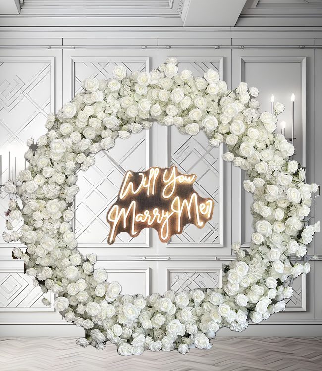 White circle flower arch rental with Marry Me Sign